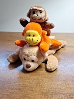 Brown and Orange Stuffed Monkeys Toy